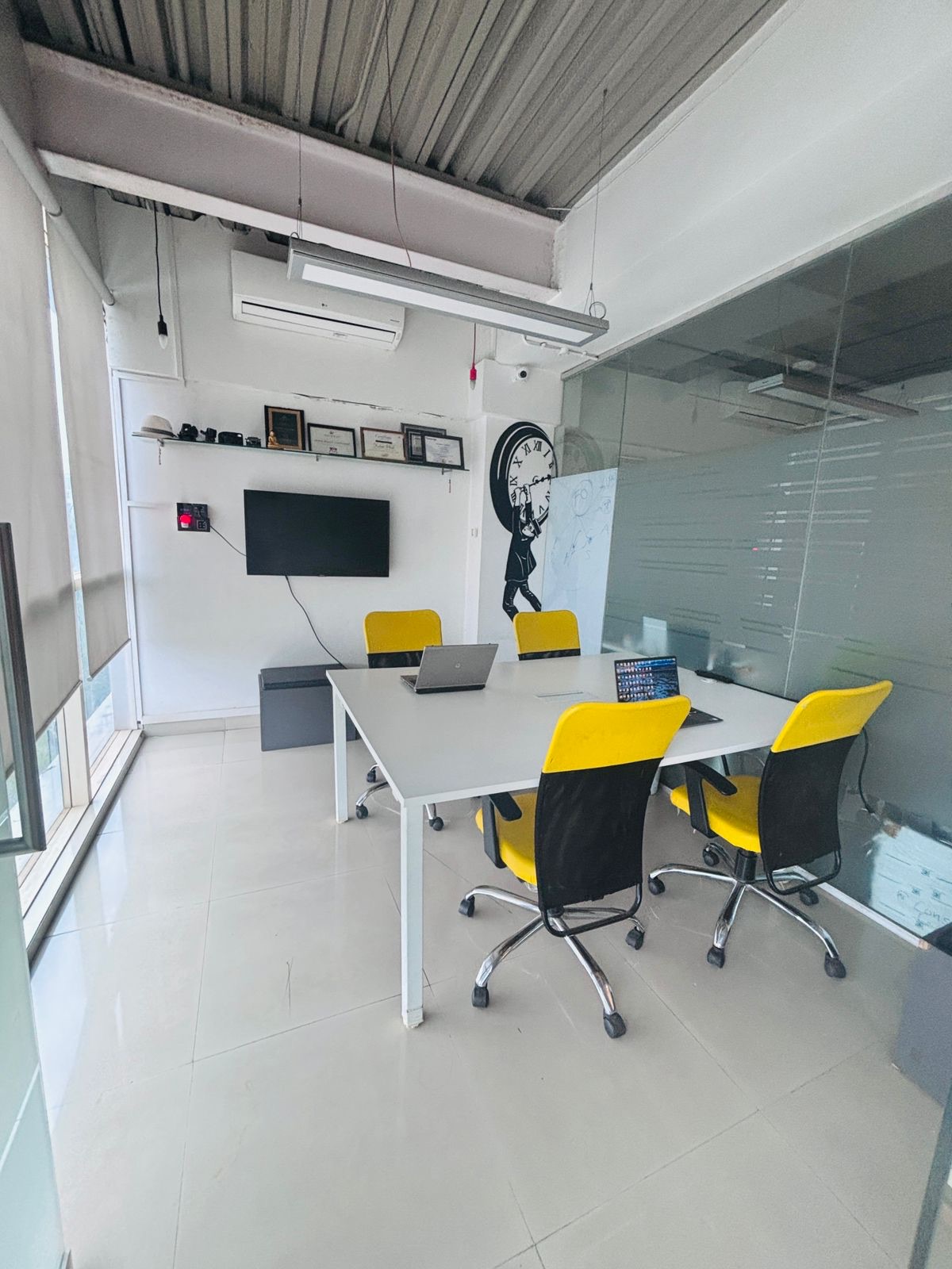 Meeting room with TV and conference table